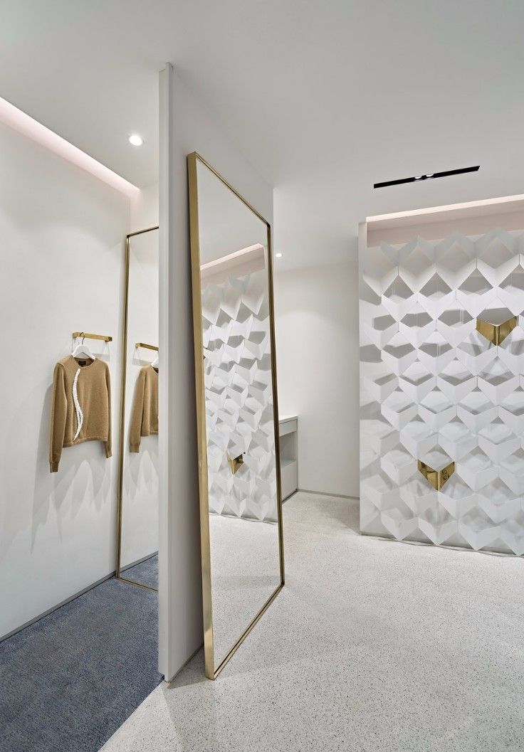 Thiết kế nội thất shop thời trang với gam màu trung tính